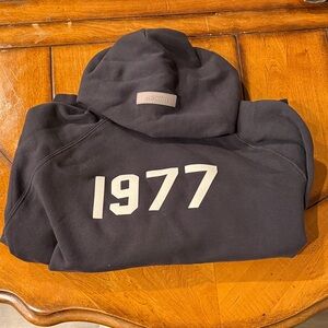 Essentials Men's Black '1977' Graphic Hoodie